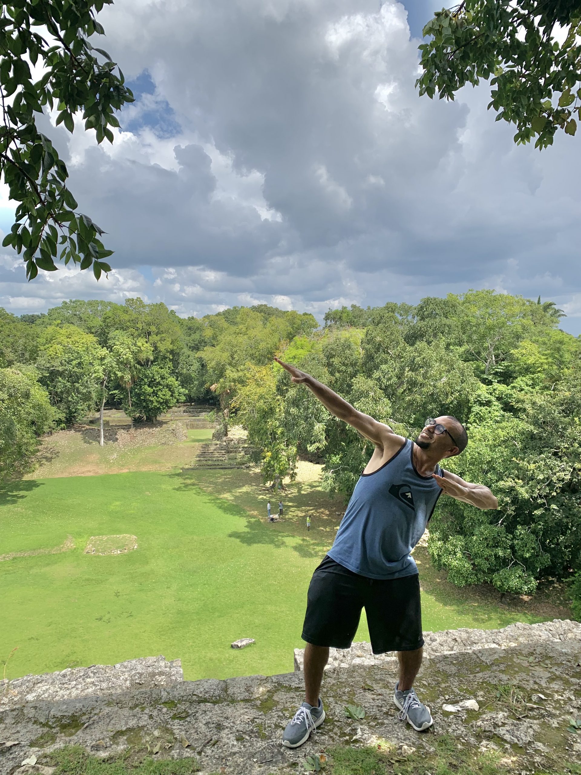 travel pose mayan ruins lamanai belize