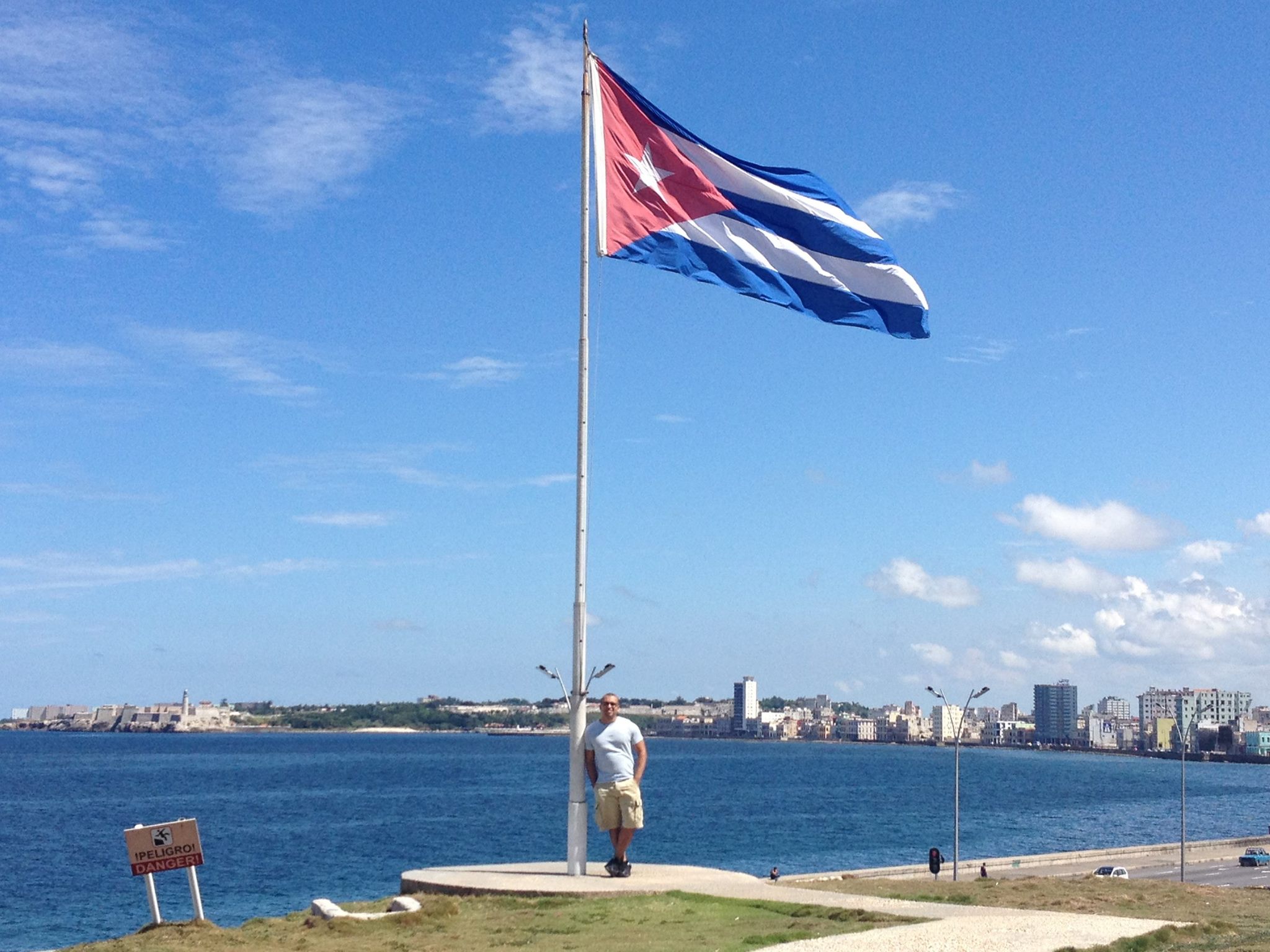 cuban flag in havana cuba pose