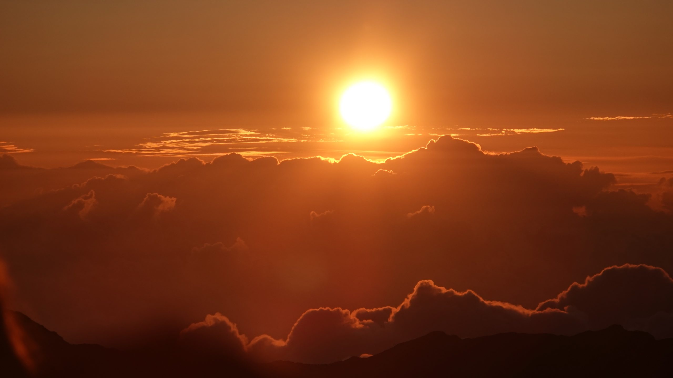 haleakala national park sunrise above the clouds