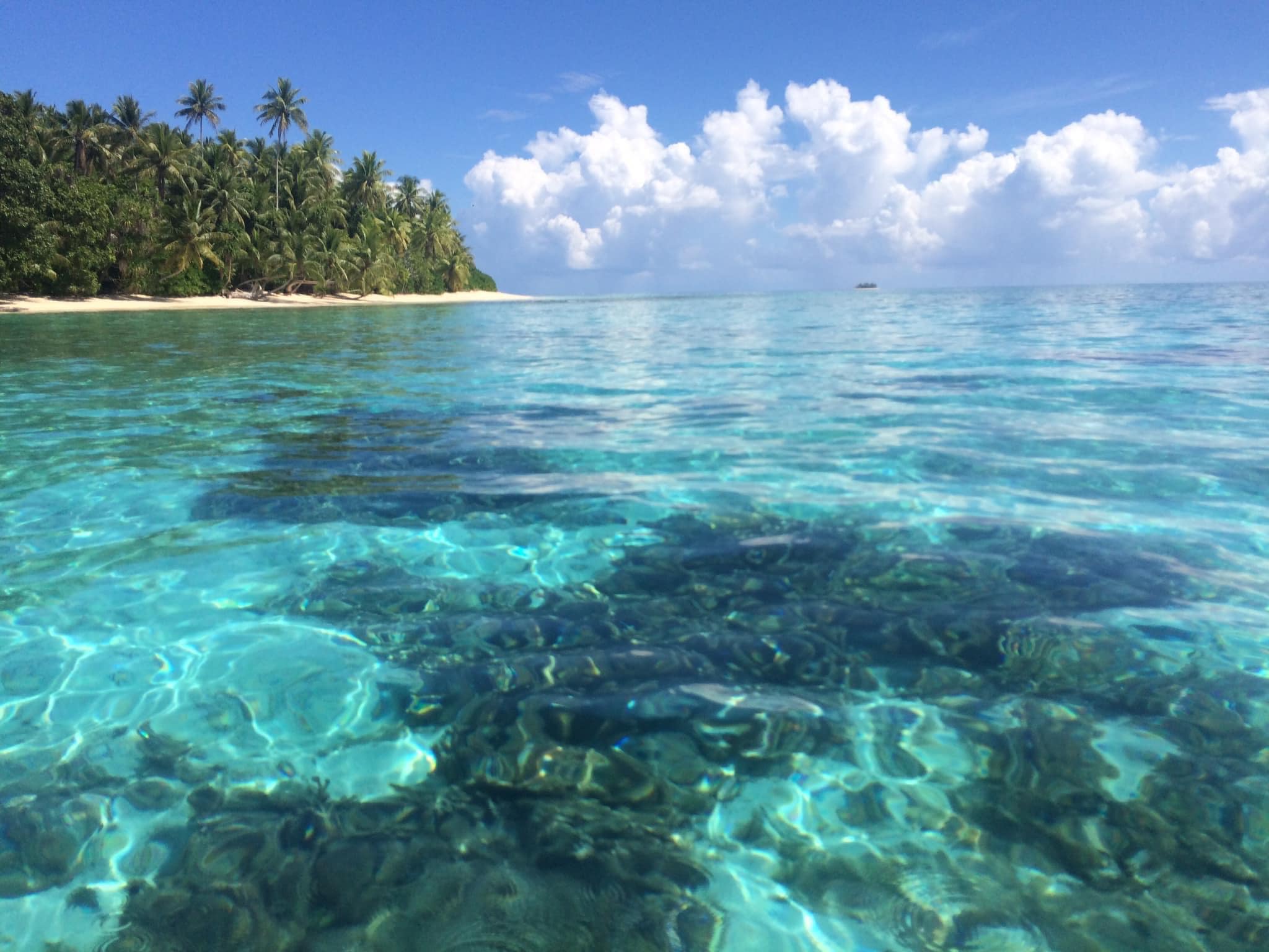 Island and blue lagoon ocean waters of Funafuti Tuvalu