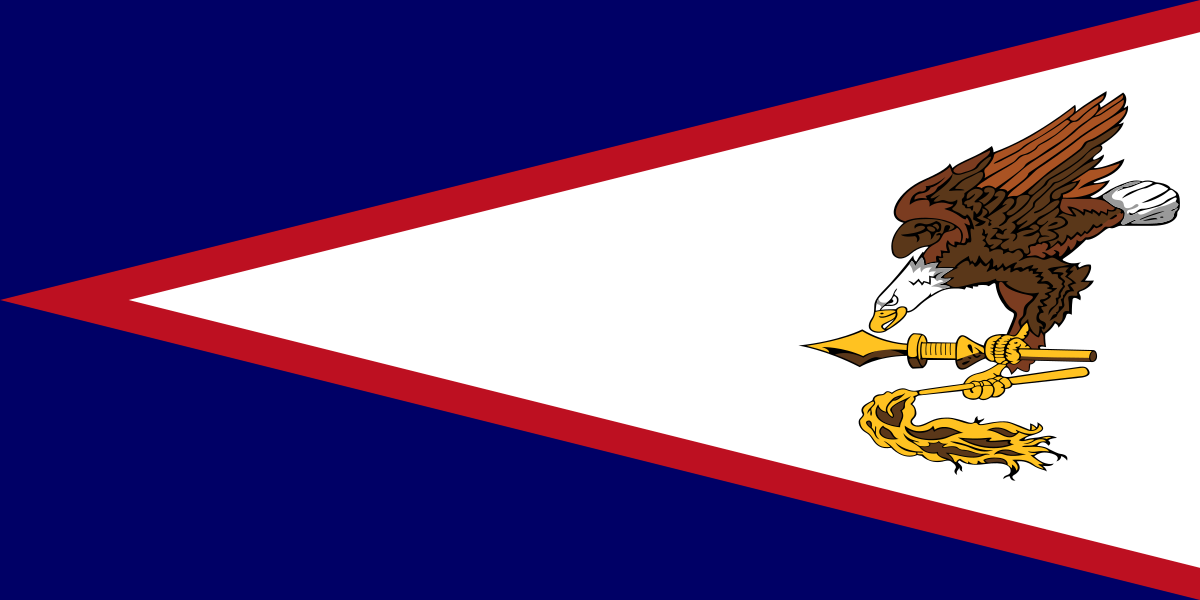 The flag of American Samoa consists of a dark blue field with a slightly off-center red-edged white triangle pointing towards the hoist. Inside the triangle are a bald eagle, a symbol of the United States, in flight, grasping a war club and a fly-switch (two traditional Samoan symbols of wisdom). The colors represent the traditional Samoan concepts of freedom (white), bravery (red), and loyalty (blue)