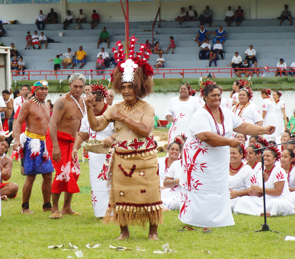 Chiefs adorned in elaborate traditional Samoan attire, displaying intricate patterns and symbols of their culture. The ornate garments reflect the heritage and significance of their roles within the community, showcasing the pride and honor of Samoan traditions.